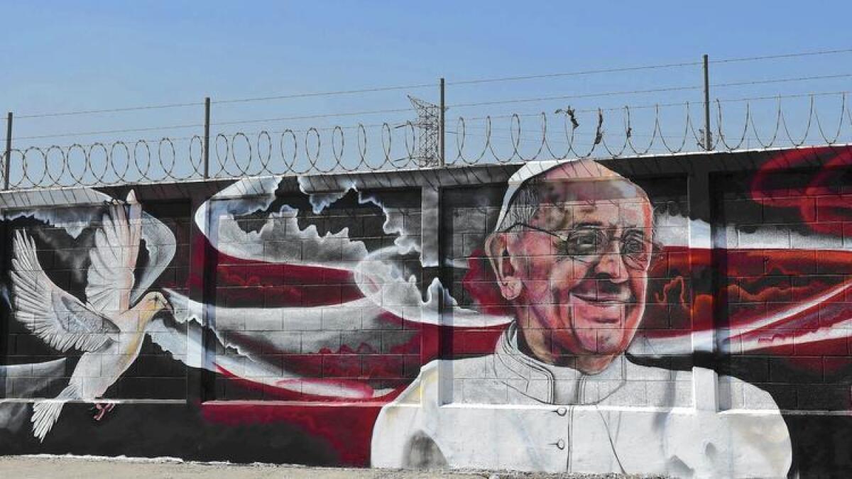 Un mural en Ecatepec, justo a las afueras de la Ciudad de México, da la bienvenida al papa Francisco, quien llegara el próximo viernes. ()