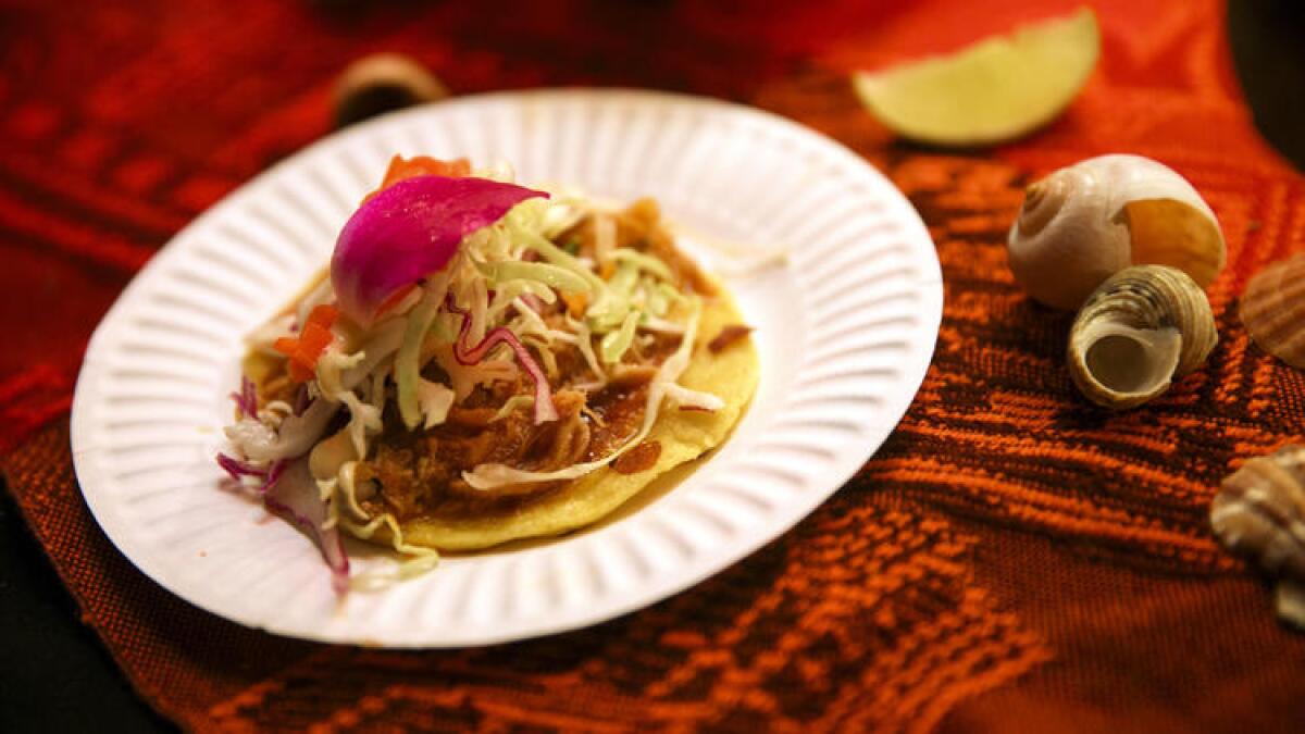 Tacos de Mantarraya (made with stingray) from El Coraloense is served.