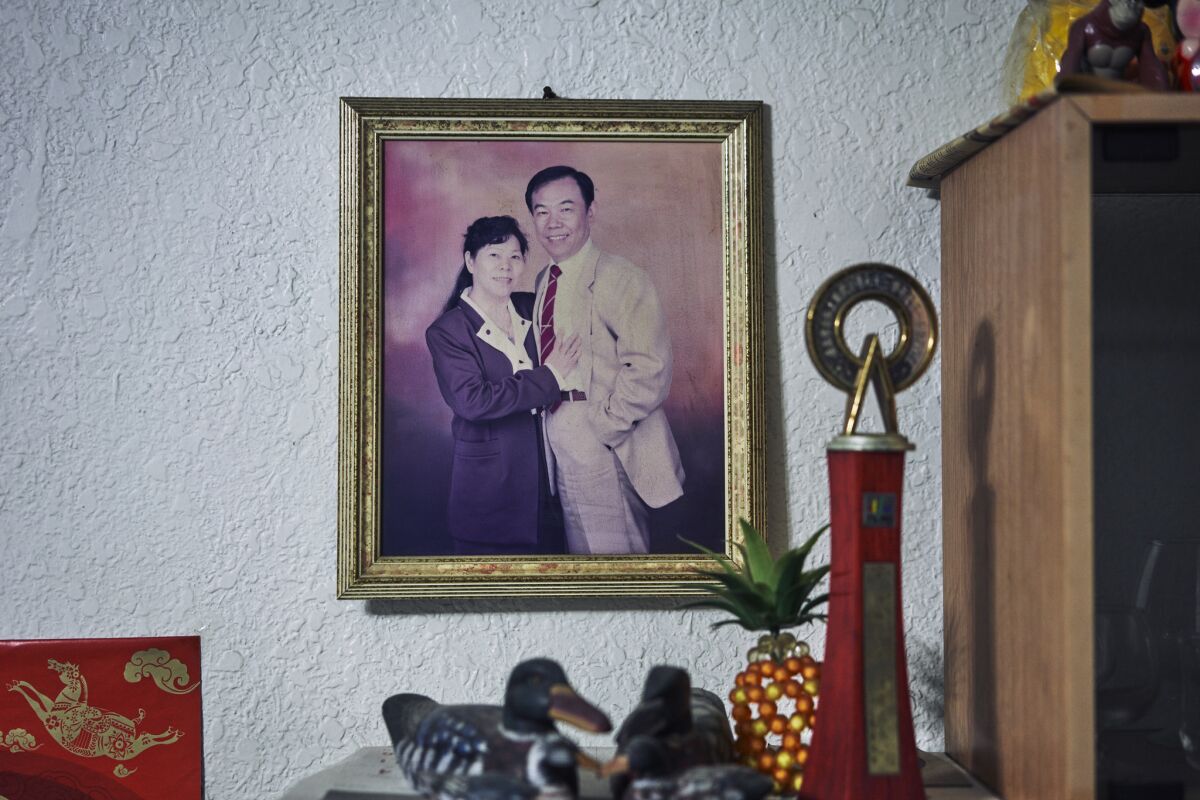 An old photograph of Mei You-nian with his wife, Tsai-hui, hangs in their Taipei home.