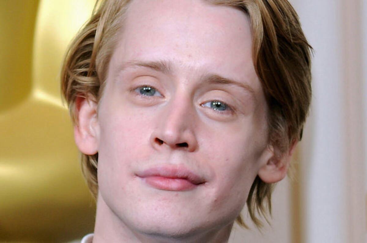 Macaulay Culkin backstage at the 82nd Academy Awards in 2010.