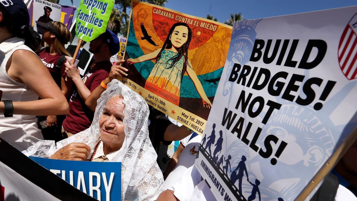 Bertha Ramirez, 72, of Fresno, came to march with thousands against President Trump's vowed crackdown on illegal immigration. (Al Seib / Los Angeles Times)