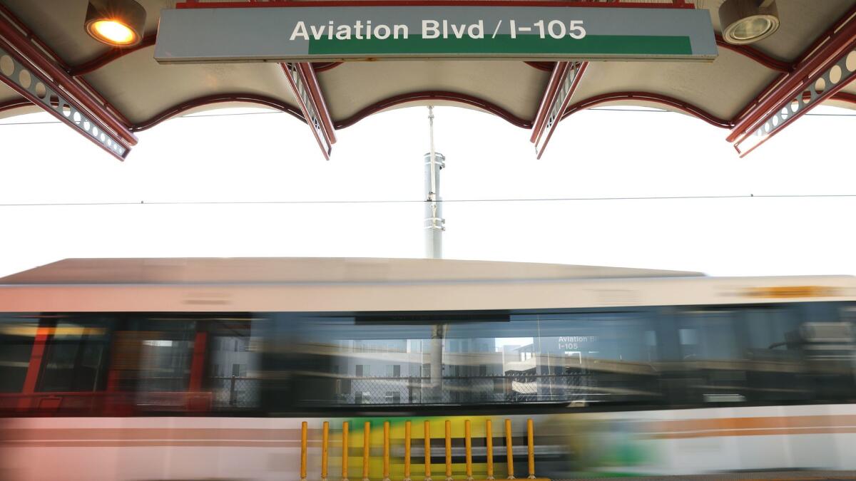 A Green Line train leaves the Aviation/LAX Station in Los Angeles on Monday. The station will temporarily close starting Friday, leaving airport-bound passengers a longer ride from a different station.