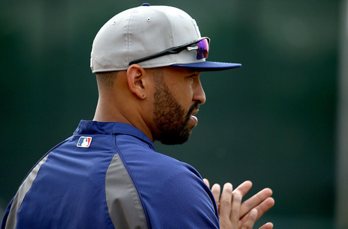 Dodgers outfielder Matt Kemp prepares to take batting practice during a workout Tuesday at Camelback Ranch in Glendale, Ariz.