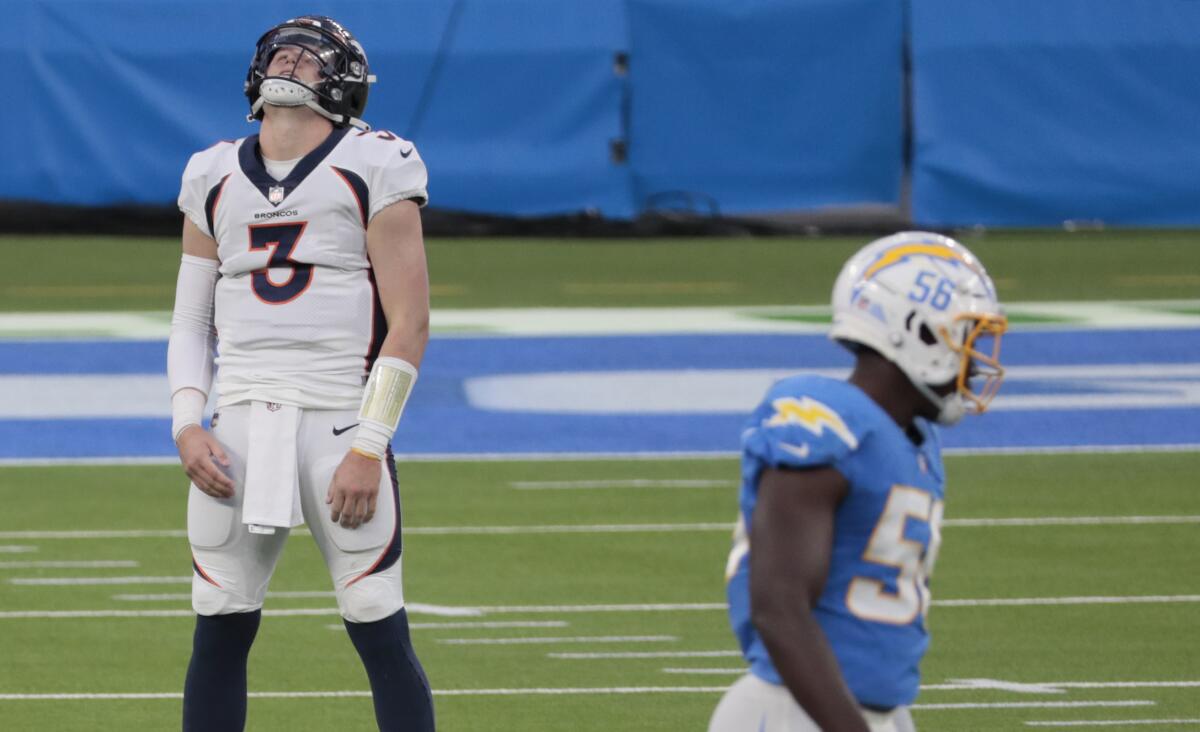 Broncos quarterback Drew Lock (3) reacts after a long pass late in the game against the Chargers was dropped.