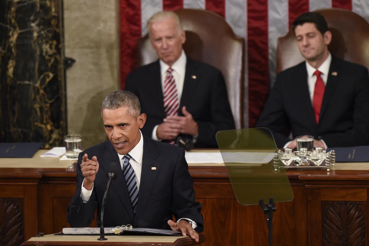 President Barack Obama gestures while giving the State of the Union address before a joint session of Congress on Capitol Hill Jan. 12.