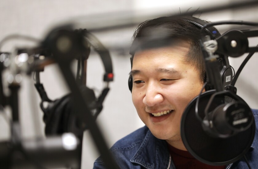Times columnist Frank Shyong recording a podcast at the L.A. Times' building in El Segundo.