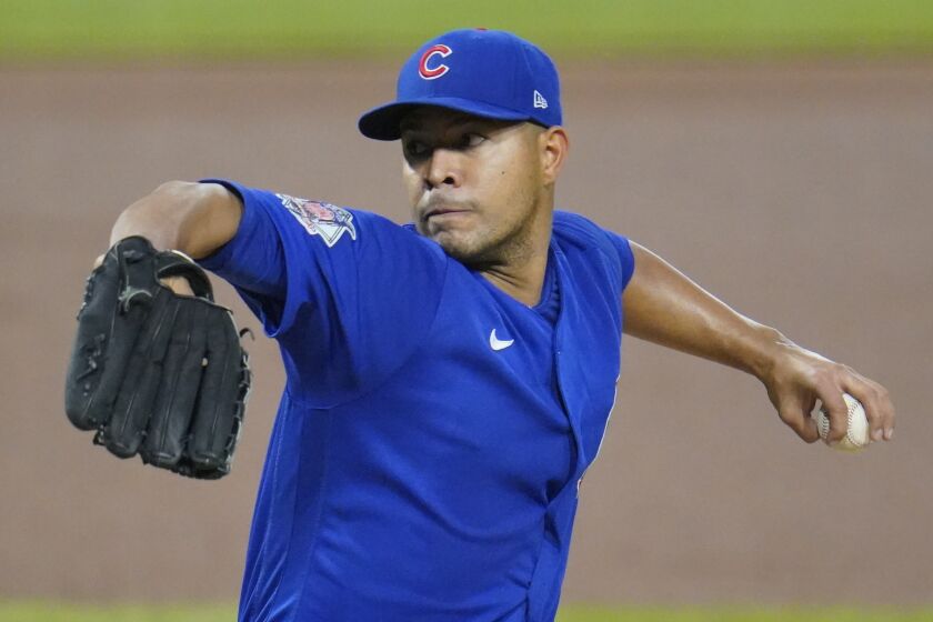 Chicago Cubs starting pitcher Jose Quintana delivers during the first inning of a baseball game.