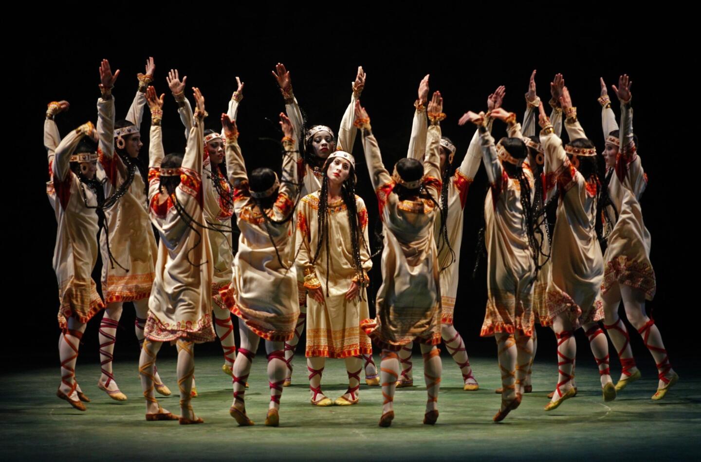 Elizabeth Hansen, playing the Chosen One, center, is surrounded by the Young Maidens as members of the Joffrey Ballet perform "The Rite of Spring" at the Dorothy Chandler Pavilion in Los Angeles.