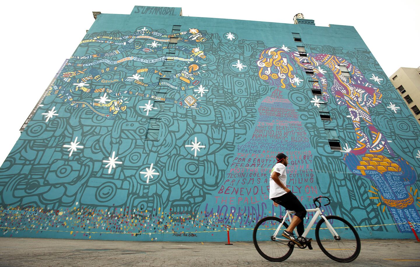 While the removal of indie rock band Foster the People's mural in downtown Los Angeles was initially delayed with the intervention of Mayor Eric Garcetti's office, when it was discovered that the mural ran afoul of preservation codes for the historic Santa Fe Lofts in August, it was painted over.