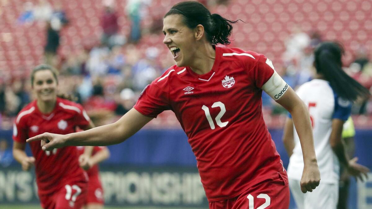 Canada forward Christine Sinclair celebrates after scoring a goal against Panama during a World Cup qualifying match in Frisco, Texas, on Oct. 14, 2018.