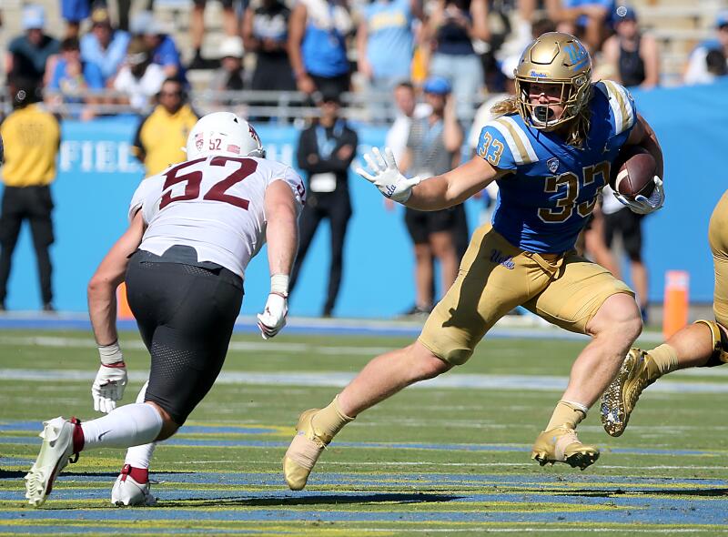 UCLA running back Carson Steele breaks free for a first down the third quarter.