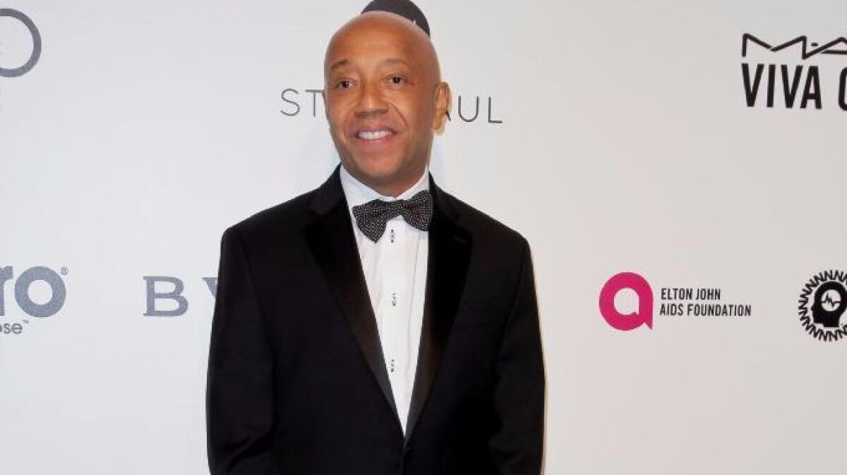 Russell Simmons arrives at the 25th annual Elton John AIDS Foundation's Academy Awards viewing party on Feb. 26.