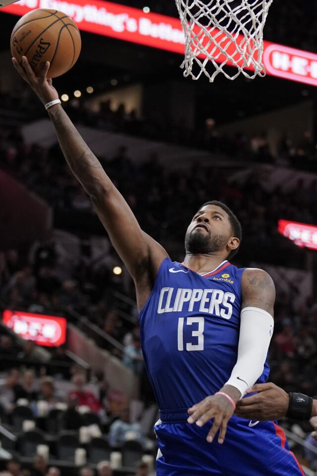 Clippers forward Paul George goes the basket during a game Nov. 29 against the Spurs.