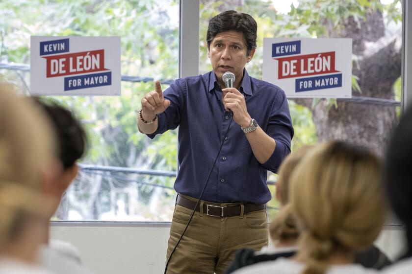 Los Angeles, CA - May 28: Mayoral candidate Kevin De Leon talks with campaign staff and volunteers at his campaign headquarters on Saturday, May 28, 2022 in Los Angeles, CA. (Brian van der Brug / Los Angeles Times)