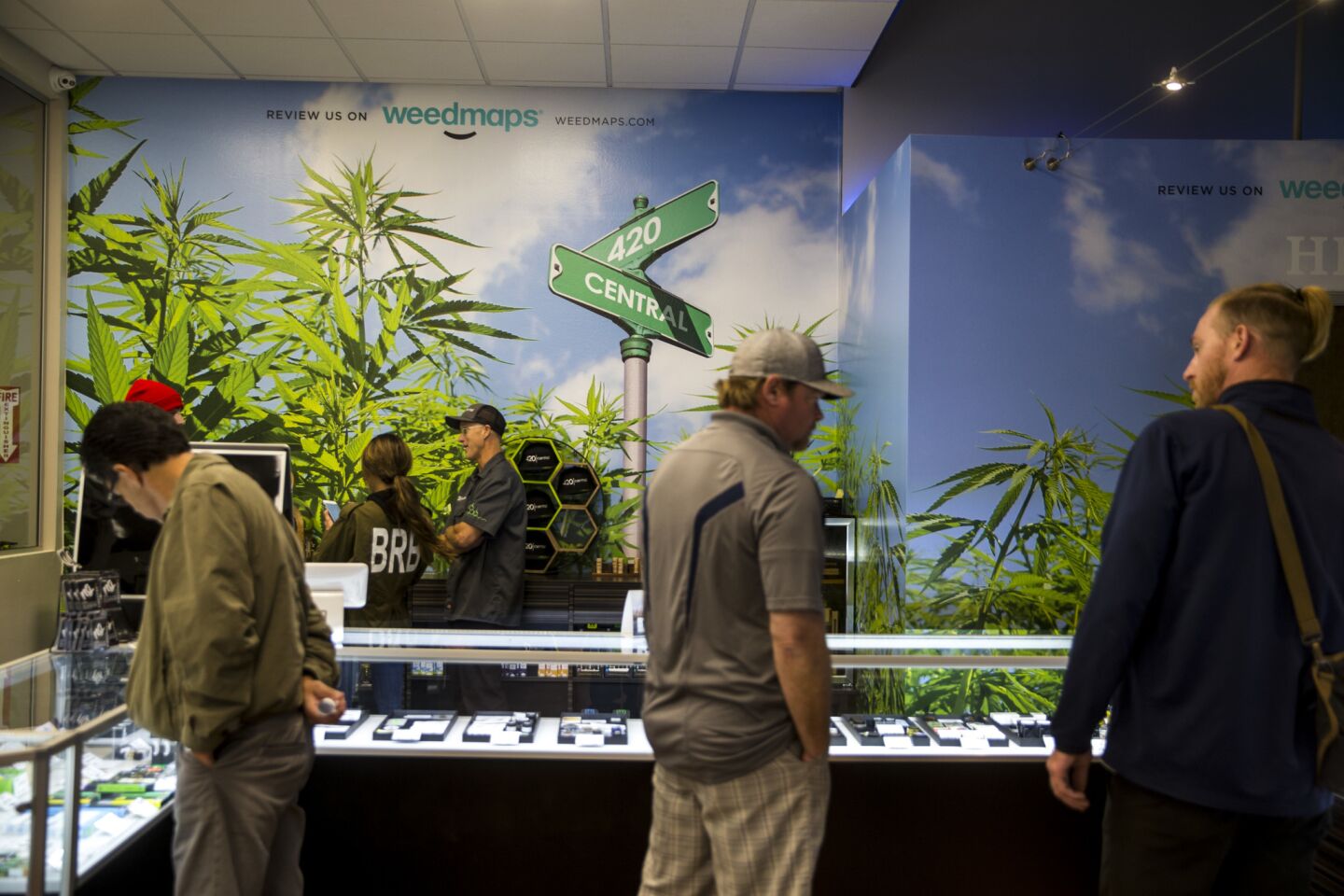 Customers at 420 Central, a marijuana dispensary in Santa Ana, on New Year's Eve.