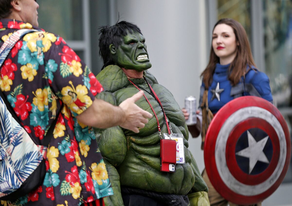 Marvel comic cosplayers dressed as the Hulk and Captain America at Wondercon 2023 show in Anaheim on Sunday.