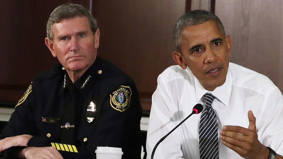 President Obama speaks alongside Terry Cunningham of the International Assn. of Chiefs of Police during a conversation on community policing on July 13, 2016, in Washington, D.C.
