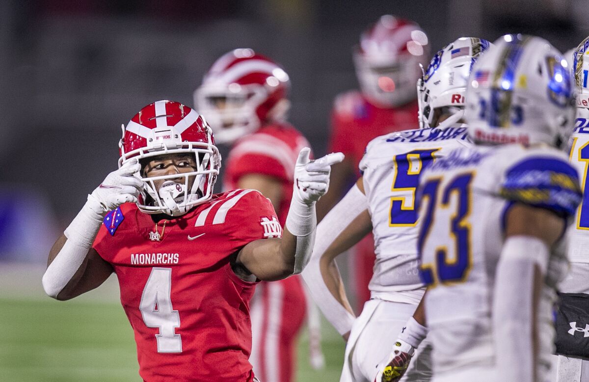 Mater Dei running back Raleek Brown celebrates after a play during a 44-7 state bowl victory over San Mateo Serra.