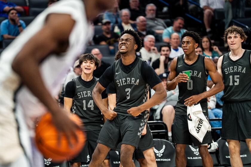 Steph Kankole of Sierra Canyon (3) shows his emotion and was a key contributor at Golden 1 Center, making four threes.