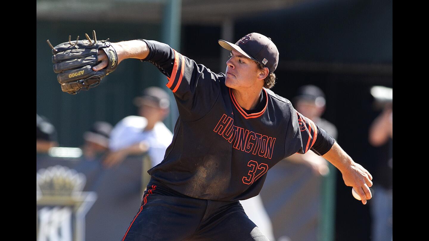 Huntington Beach's Nick Pratto pitched a complete 3-0 shutout against Servite in a second round CIF Southern Section Division 1 playoff game on Tuesday, May 23.