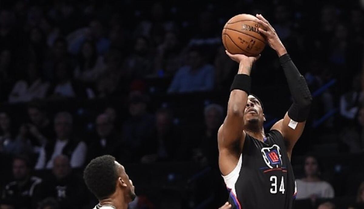Clippers veteran Paul Pierce rises up for a shot during a game against the Brooklyn Nets on Dec. 12.
