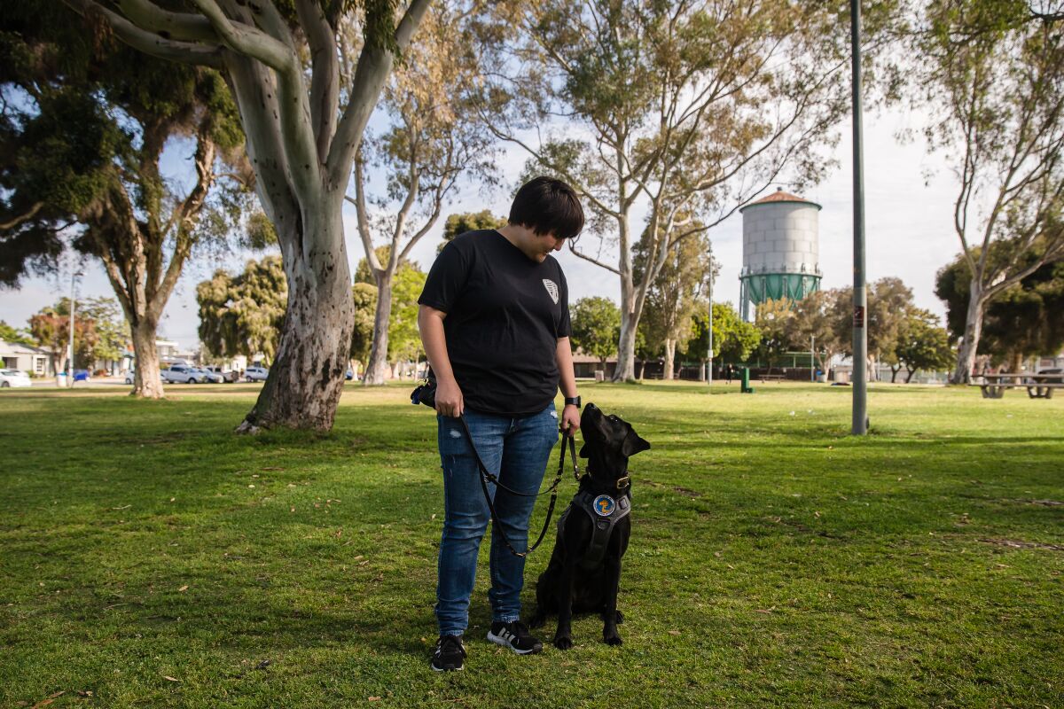 Marine veteran Jessica Belcher’s was paired with service dog, Lucy, who helps her cope with post-traumatic stress disorder.