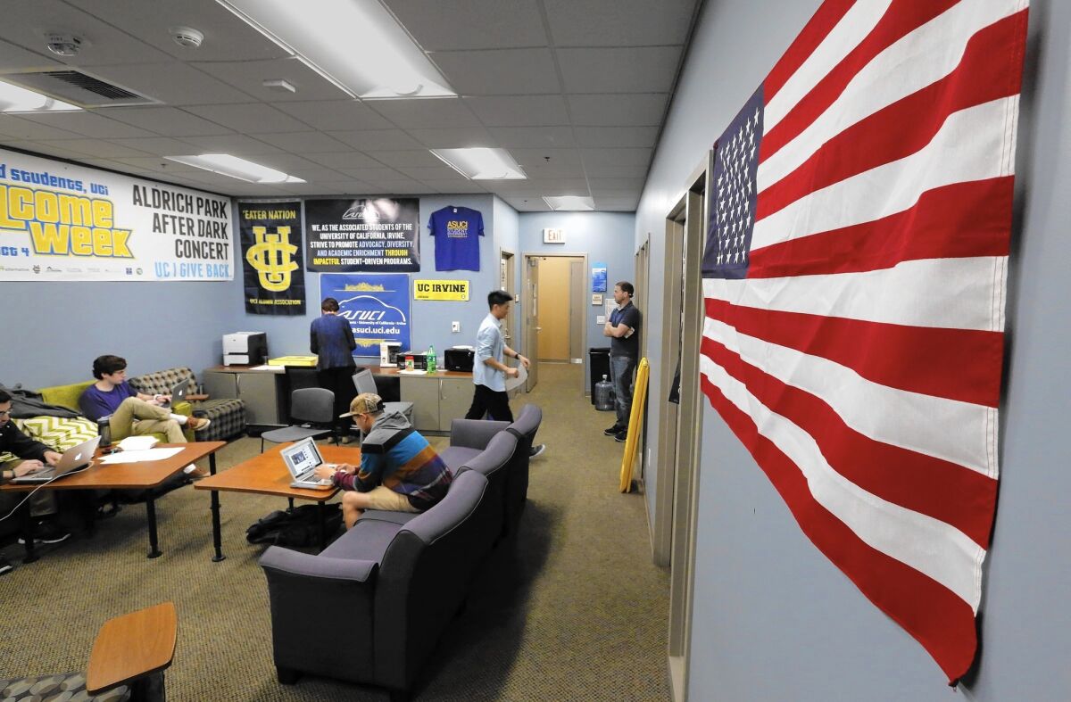The American flag has been rehung on the wall of the UC Irvine student government center.