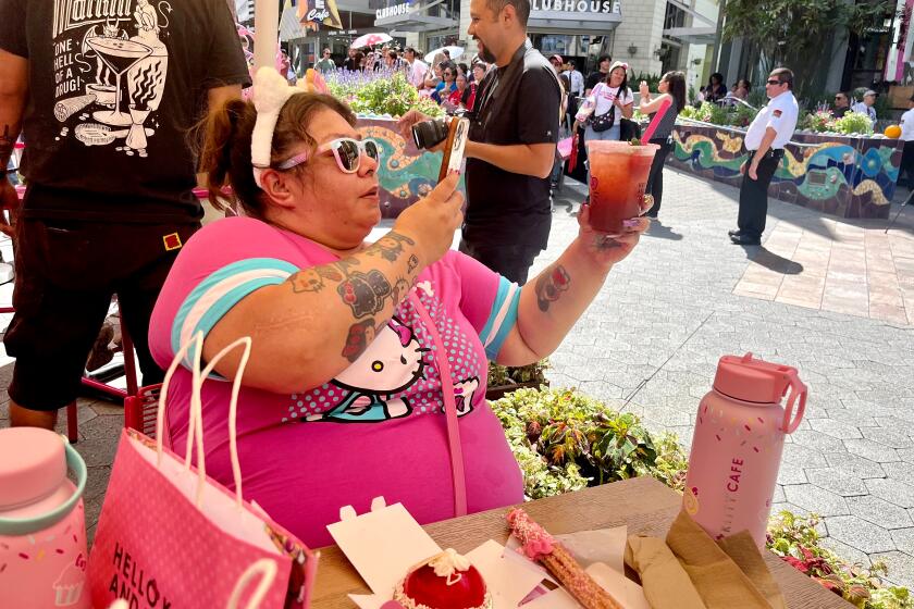 CITYWALK AT UNIVERSAL STUDIOS HOLLYWOOD - Friday, Sept. 6, 2024 - Nevis Aguillon was among the first people in line at the grand opening of The Hello Kitty and Friends Cafe in Los Angeles, Calif. (Cindy Carcamo / Los Angeles Times)