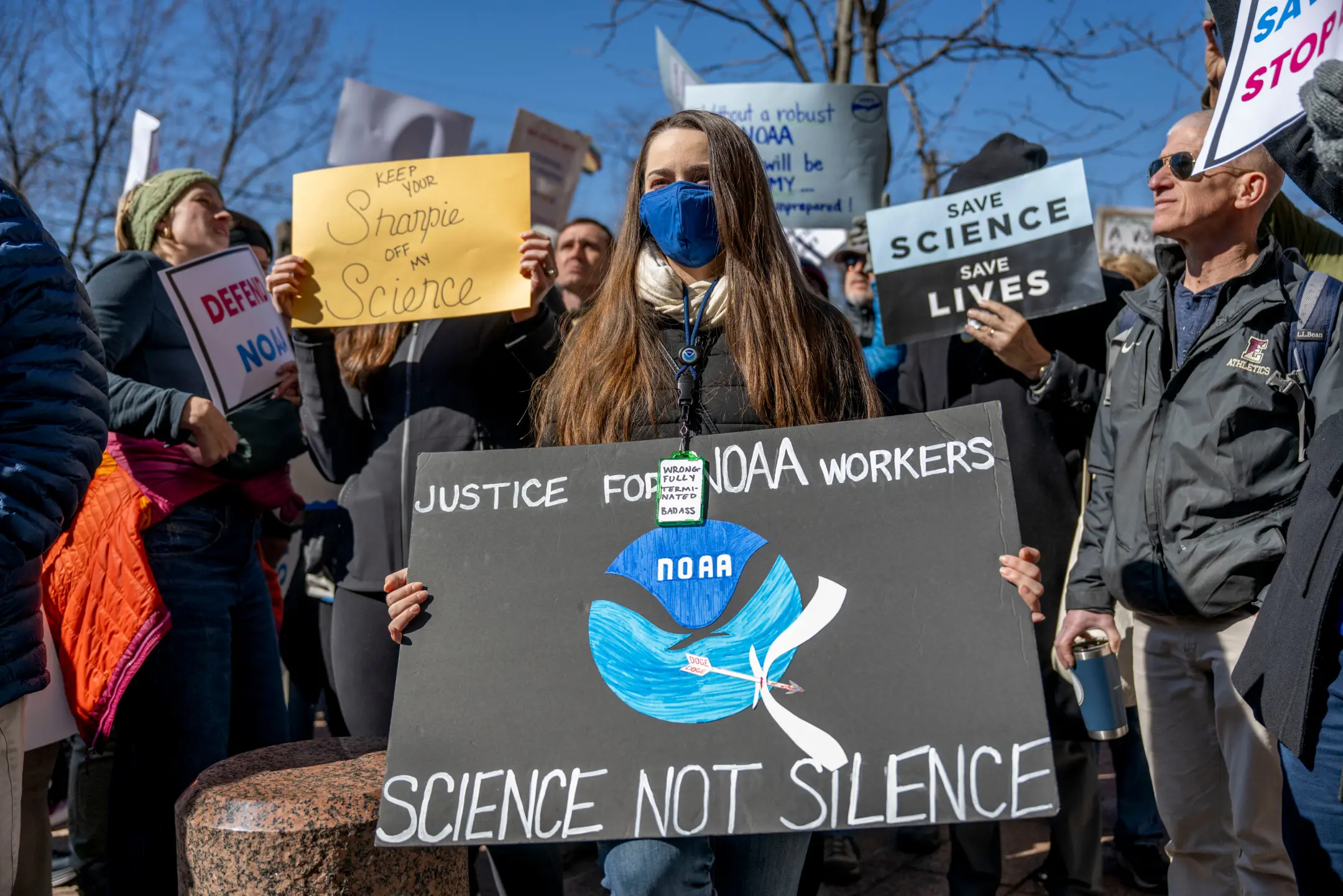 Trump administration cuts to NOAA threaten efforts to save sea lions from toxic plankton A former employee of the National Oceanic and Atmospheric Administration (NOAA) holds a sign during a protest at the agency's headquarters in Silver Spring, Maryland, US, on Monday, March 3, 2025. The Trump administration fired hundreds of employees at the top US agency overseeing weather prediction and climate research, raising concerns about the nation's preparedness amid wildfire and tornado warnings. (Daniel Heuer/Bloomberg via Getty Images)