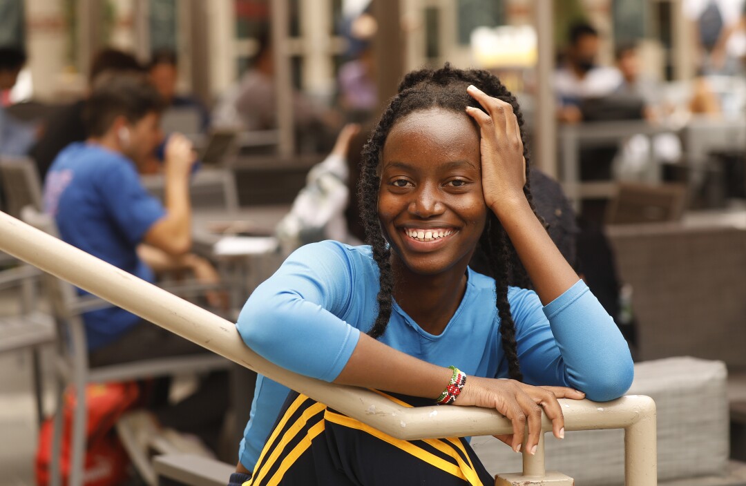 Lesley Omenge, a USC student smiles on campus.