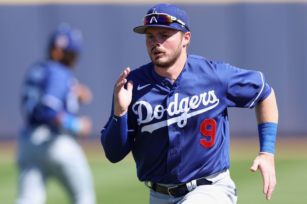 Dodgers shorstop Gavin Lux tore his ACL during a spring training game on Monday.