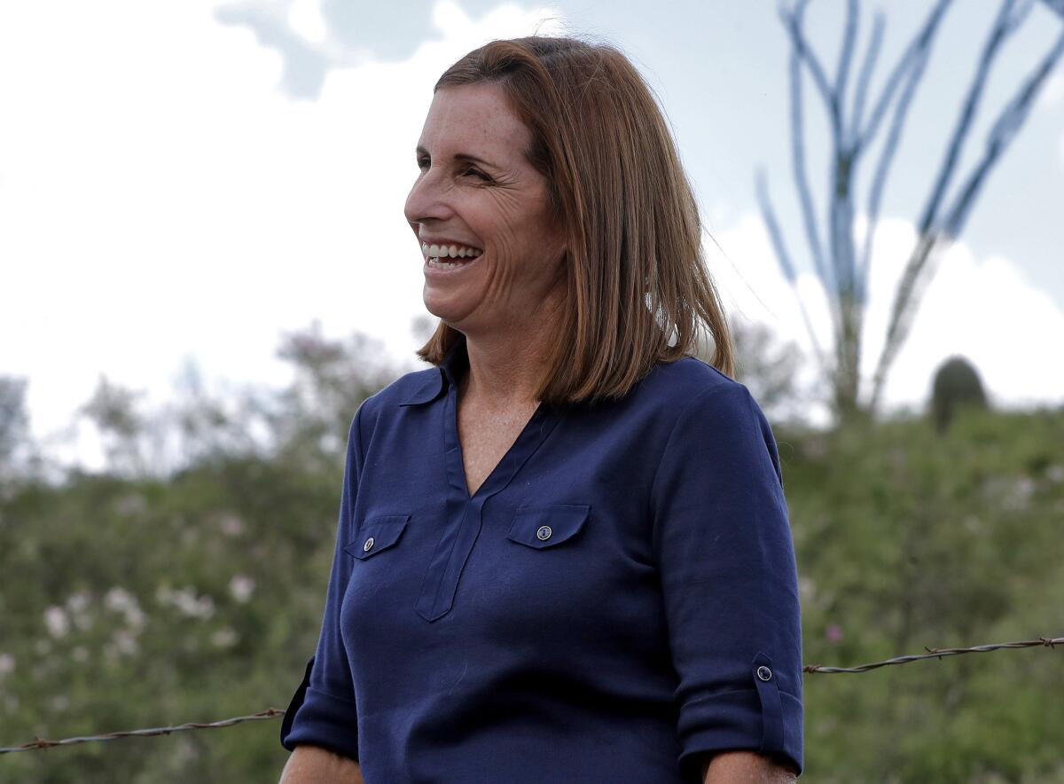 Rep. Martha McSally (R-Ariz.), who is running for the U.S. Senate, laughs while touring near the border with Mexico, south of Arivaca, Ariz.