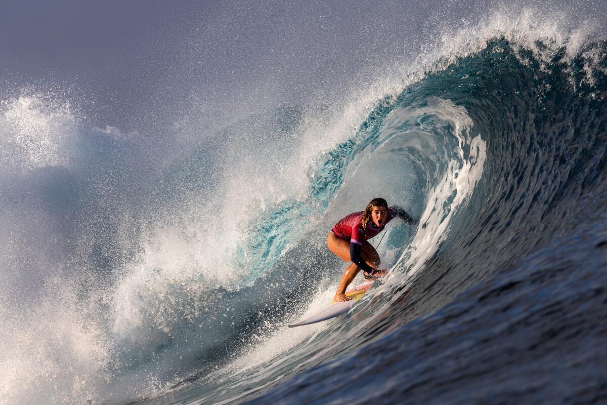 Caroline Marks of Team United States rides a wave in Teahupo'o during the Paris Olympics. 