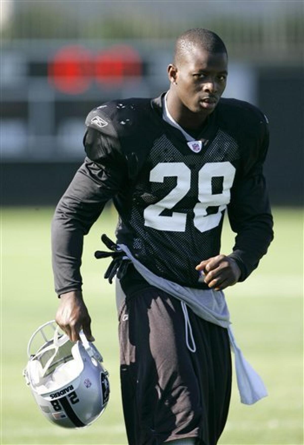 In this July 31, 2008, file photo, Oakland Raiders safety Gibril Wilson is seen during football training camp in Napa, Calif. Wilson, a five-year veteran released last week by the Oakland Raiders, signed a $27.5 million, five-year deal with the Miami Dolphins. (AP Photo/Eric Risberg, File)