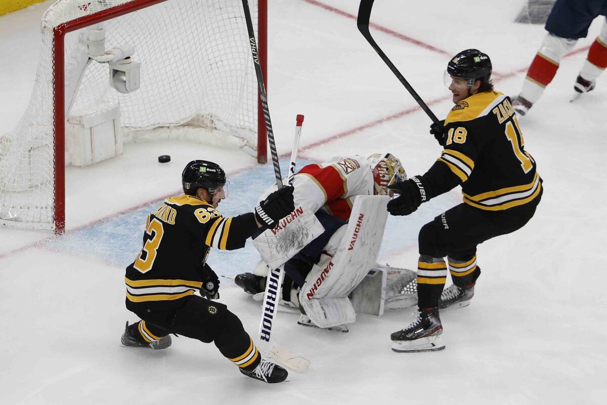 Brad Marchand scores game-winner as Bruins defeat Rangers in OT