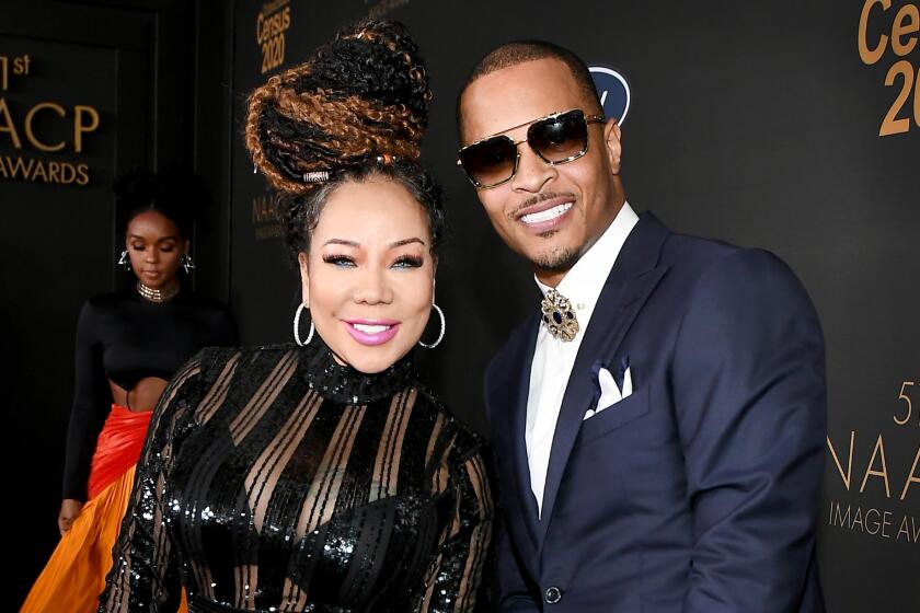 PASADENA, CALIFORNIA - FEBRUARY 22: (L-R) Tameka Cottle, T.I., attend the 51st NAACP Image Awards, Presented by BET, at Pasadena Civic Auditorium on February 22, 2020 in Pasadena, California. (Photo by Paras Griffin/Getty Images for BET)