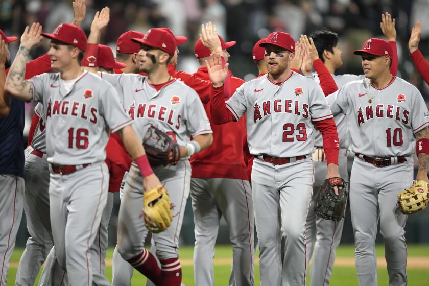 The Los Angeles Angels celebrate the team's 6-4 win over the Chicago White Sox in a baseball game.