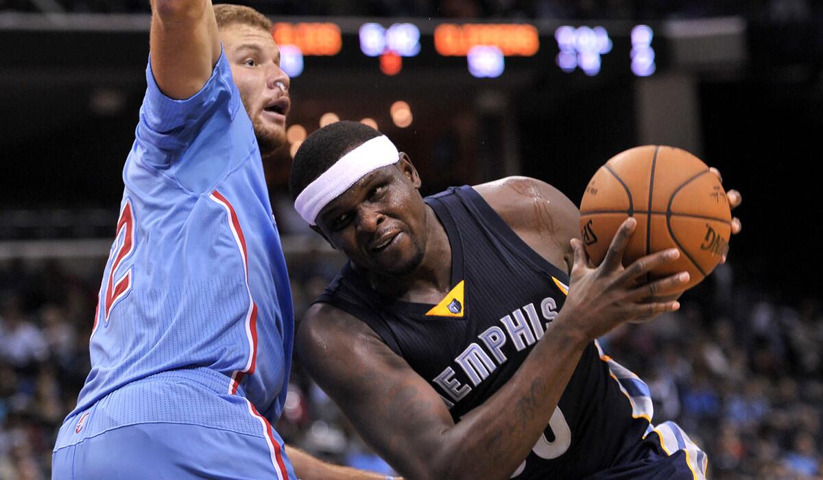 Grizzlies power forward Zach Randolph tries to drive past Clippers power forward Blake Griffin in the second half Sunday.