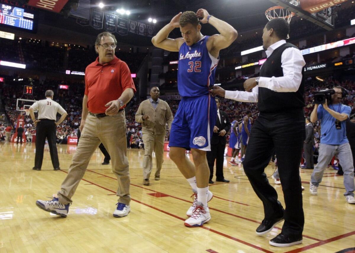 Clippers forward Blake Griffin leaves a game against the Houston Rockets after suffering lower back spasms.