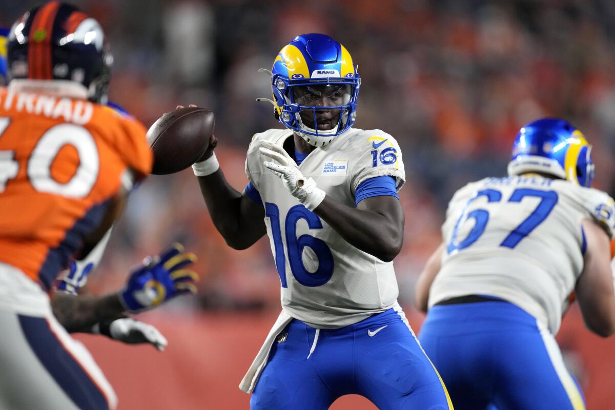 Rams quarterback Bryce Perkins throws against the Denver Broncos on Saturday.