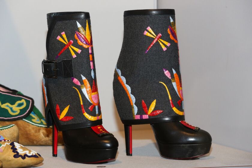 High-heeled boots by Jamie Okuma (Luise-o-Shoshone), 2012. Leather, wool felt, porcupine quills, thread, sequins, dyes, plastic. 10 inches.