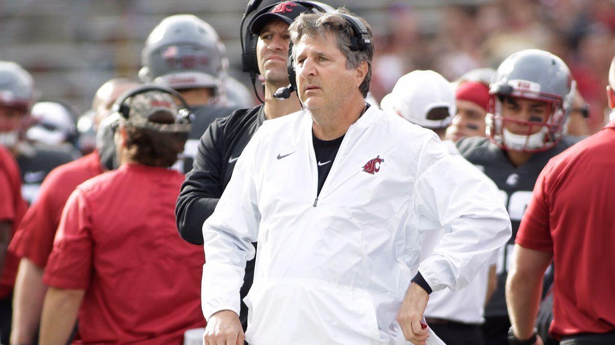Washington State coach Mike Leach watches a first-half play against Oregon State on Saturday.