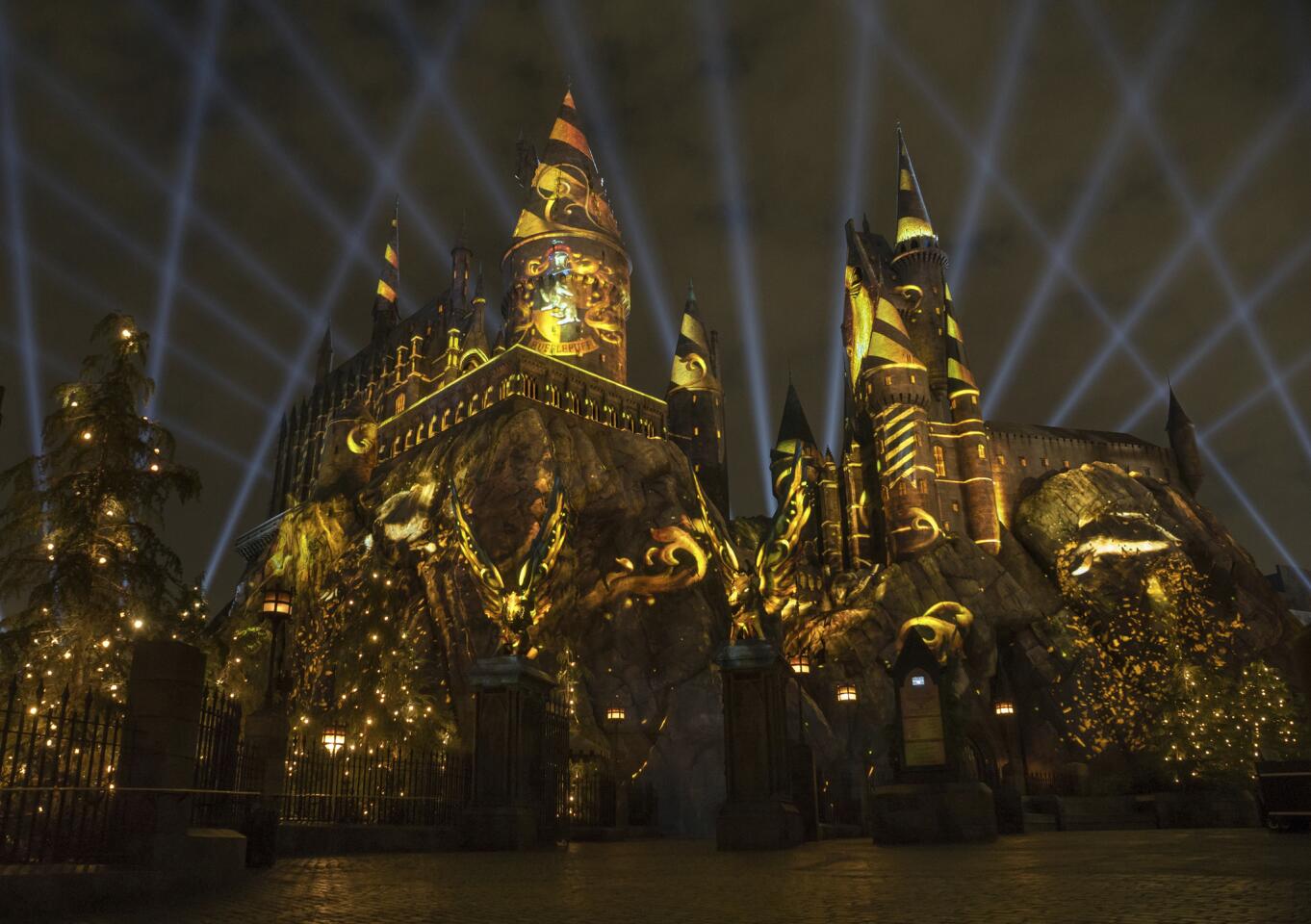 This photo provided by Universal Studios Hollywood in Los Angeles shows Nighttime Lights at Hogwarts Castle. The colorful display of lights accompanied by music will illuminate Hogwarts at Universal's Wizarding World of Harry Potter beginning in late June.