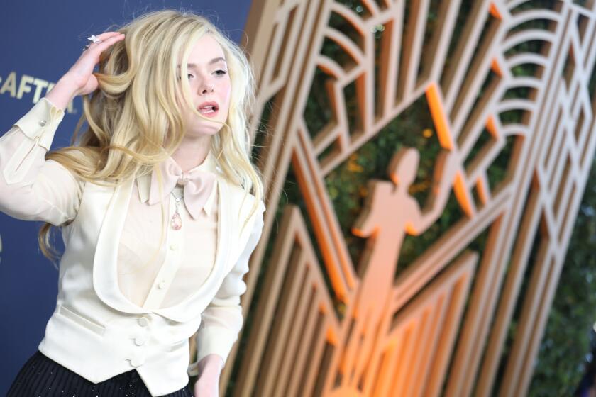 SANTA MONICA, CA - February 27, 2022. Elle Fanning arriving at the 28th Screen Actors Guild Awards at the Barker Hangar on Sunday, February 27, 2022. (Jay L. Clendenin / Los Angeles Times)