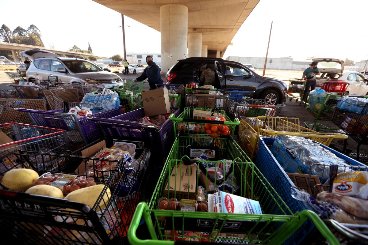 Stockton's residents getting food at the Emergency Food Bank in December.