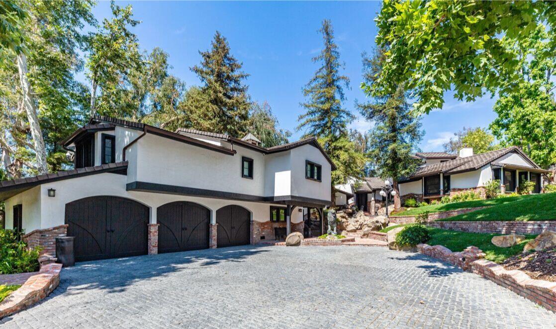 The Tudor-style home.