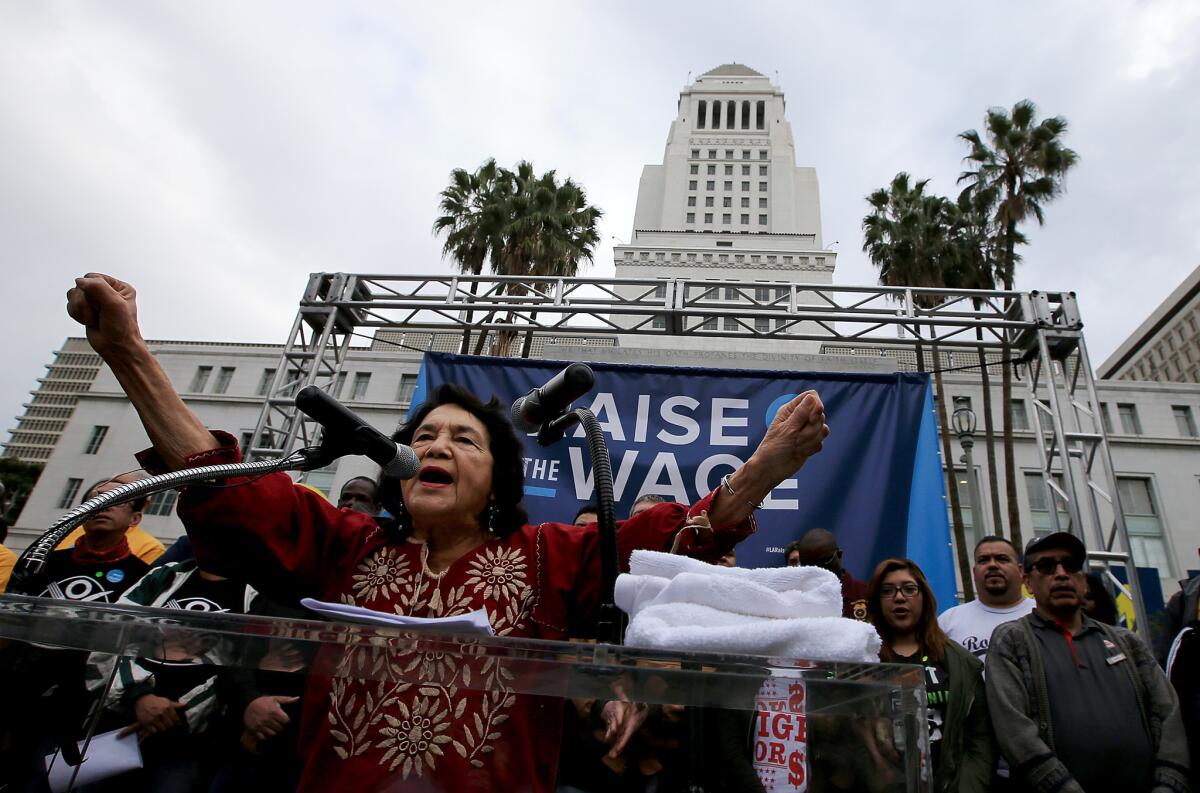 In a January rally outside Los Angeles City Hall, labor leader Dolores Huerta urges the City Council to increase the minimum wage.
