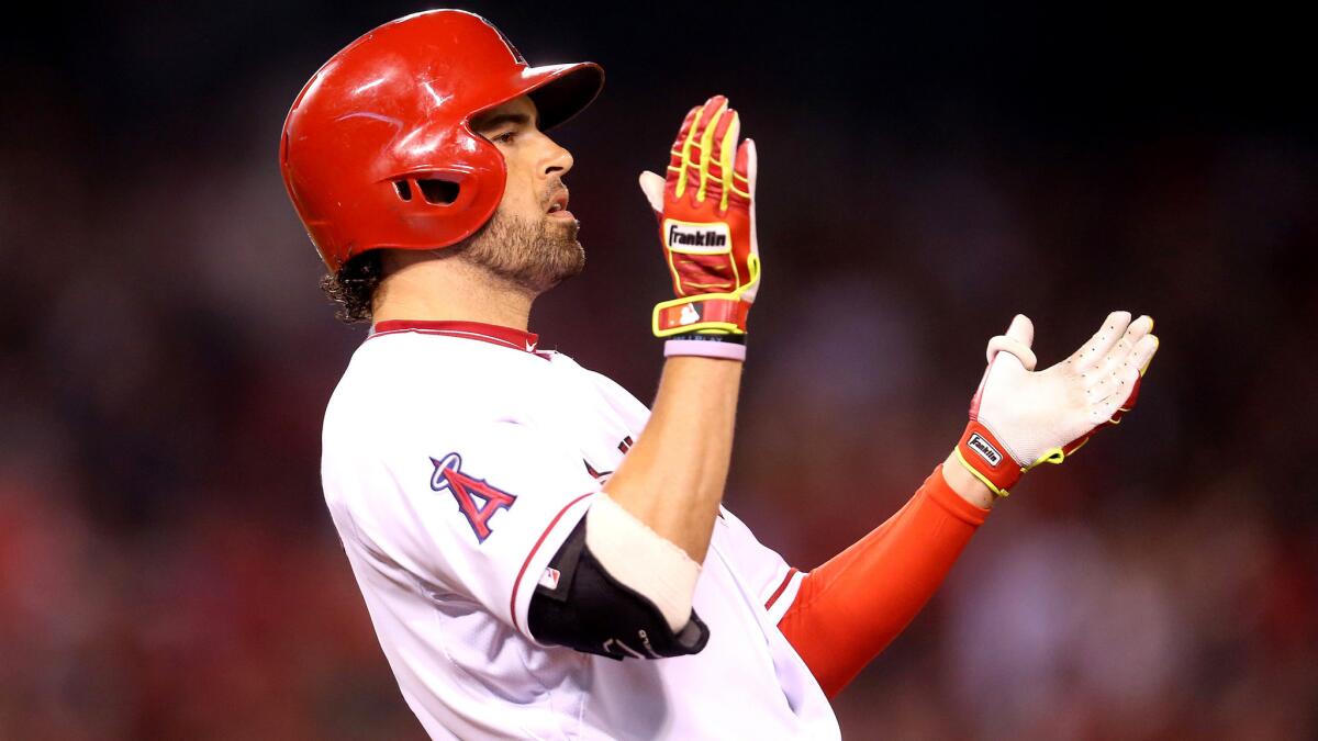 Angels outfielder David DeJesus reacts after delivering a run-scoring single against the Orioles during a game on Aug. 7 in Anaheim.