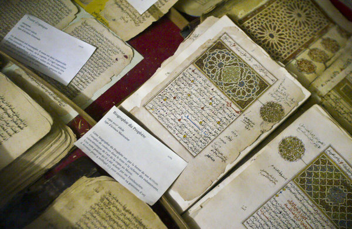 In this photo taken in 2004 are some of the 20,000 preserved ancient Islamic manuscripts housed at Timbuktu's Ahmed Baba Institute, which has been torched.