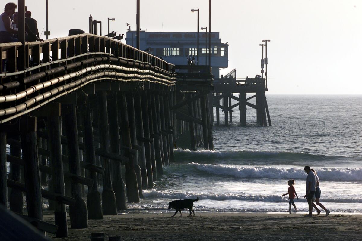 The Newport Pier in Newport Beach. Lifeguards discovered a body floating in the water near the pier on Tuesday.